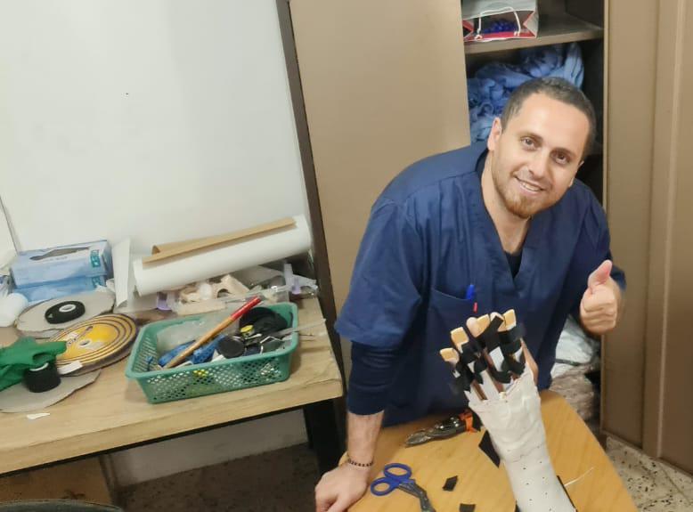 Omar Hayek working at the Gaza City Clinic 